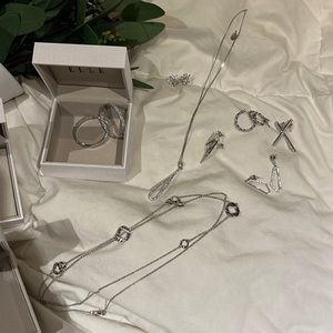 Shimmering sterling silver jewelry bundle by ELLE jewelry . New in boxes .